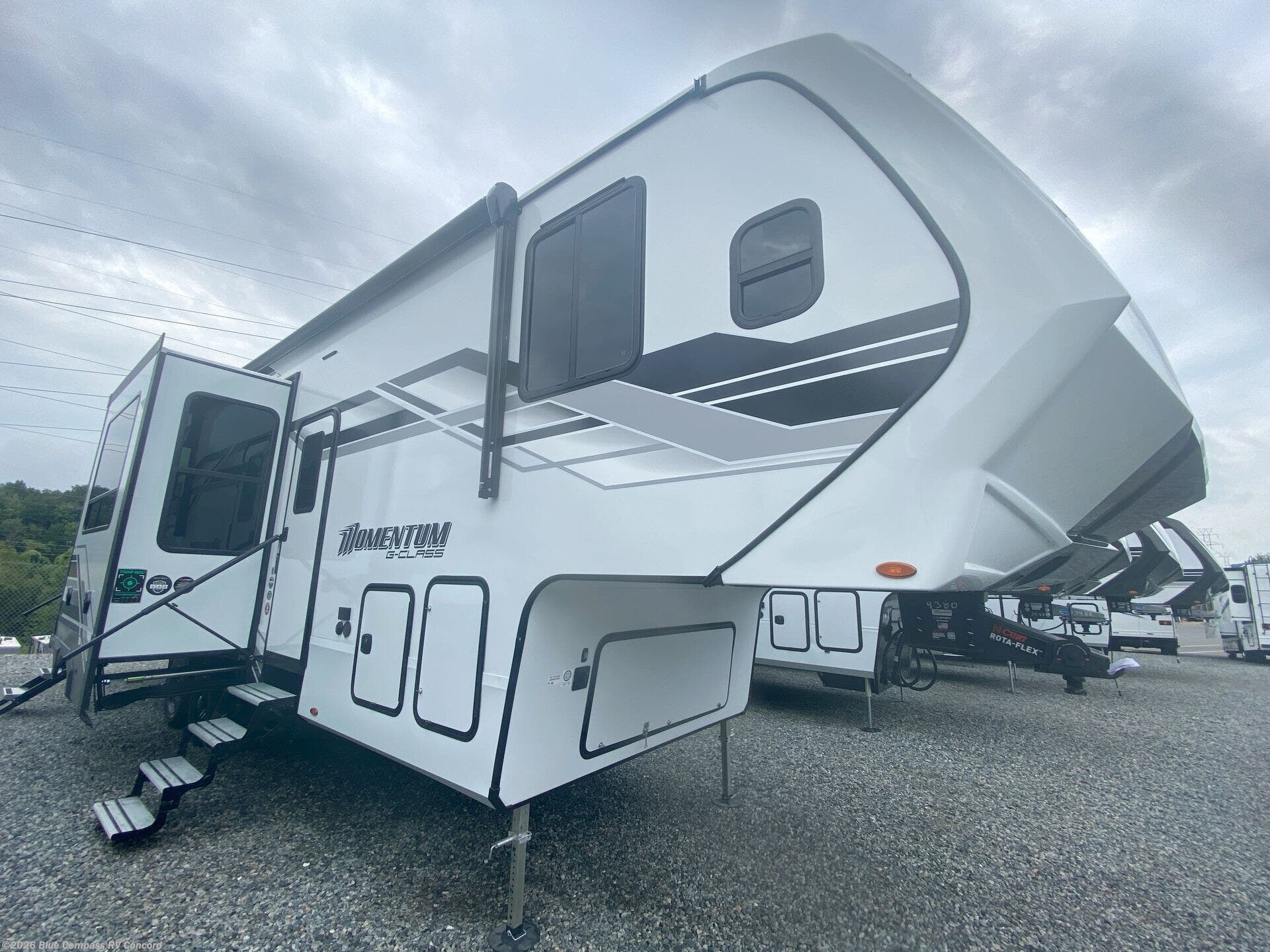 Contact us now about this 2026 Grand Design Momentum G-Class 320G! 2026 Momentum G-Class 320G by Grand Design from Blue Compass RV Concord in Concord, North Carolina
