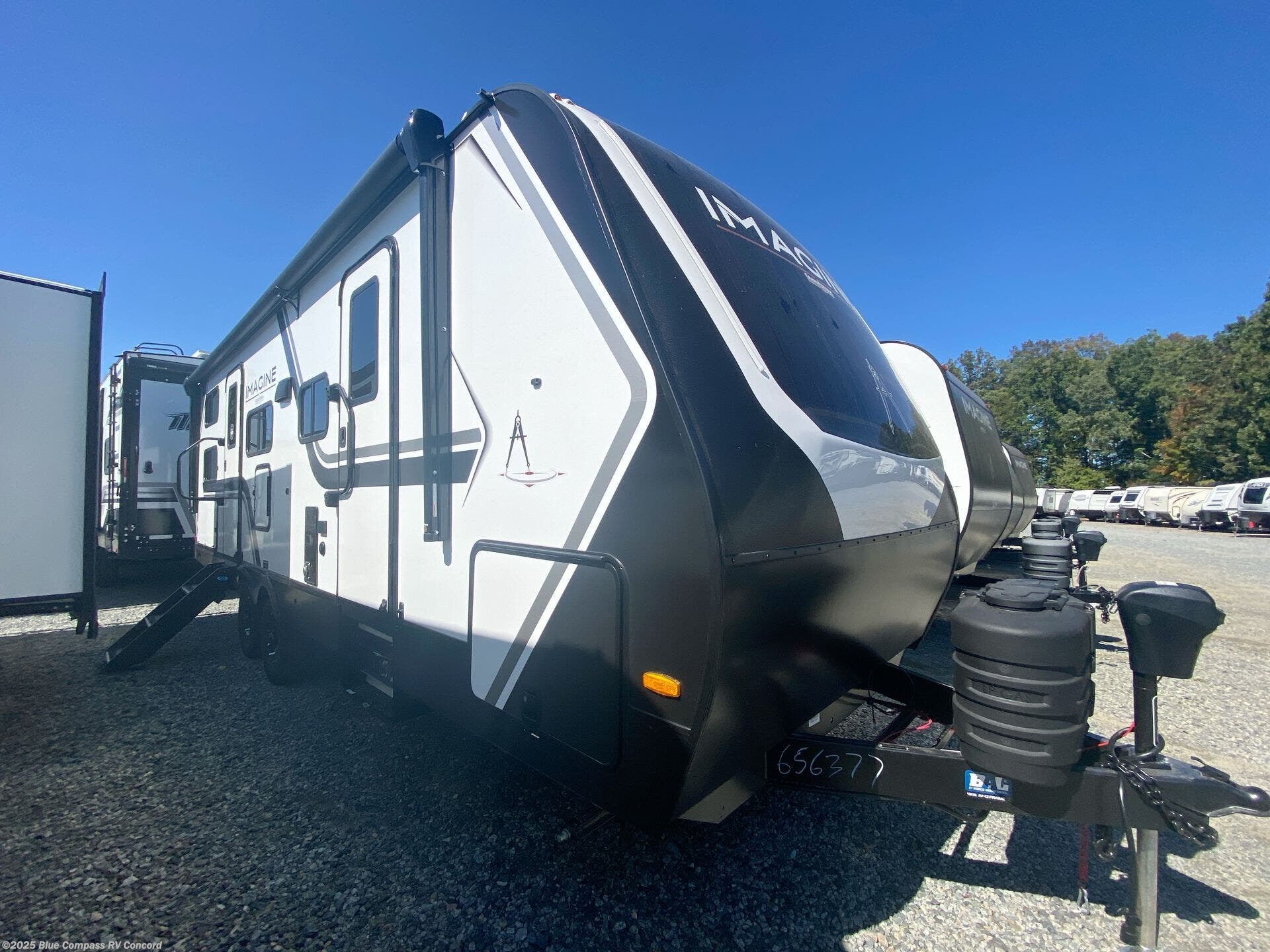 Call now about this 2026 Grand Design Imagine 2470BH! 2026 Grand Design Imagine 2470BH - New Travel Trailer For Sale by Blue Compass RV Concord in Concord, North Carolina features Slideout