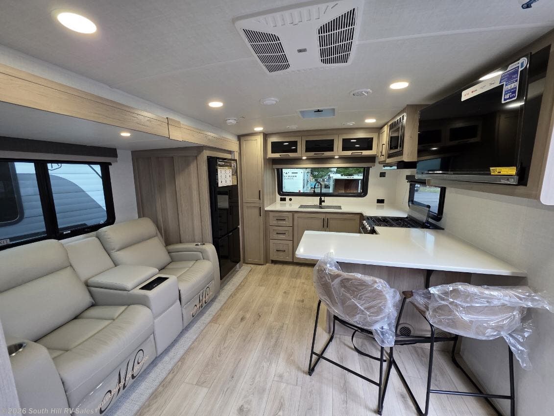 Call now about this 2026 Forest River Rockwood Mini Lite 2523MBR! 2026 Forest River Rockwood Mini Lite 2523MBR - New Travel Trailer For Sale by South Hill RV Sales in Puyallup, Washington features Awning, Air Conditioning, Solar Panels, Microwave, TV Antenna