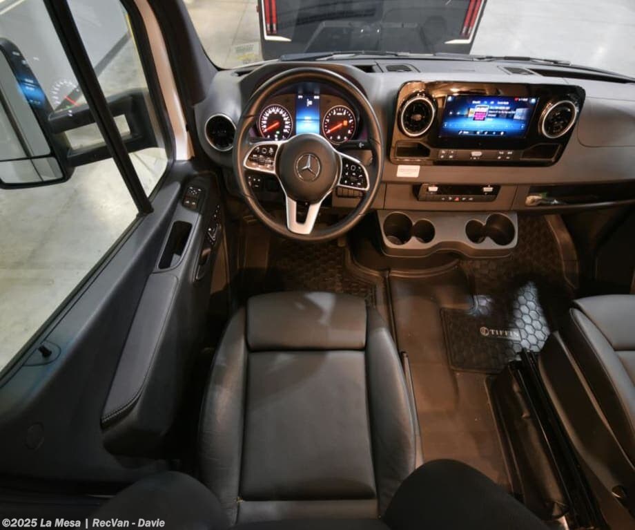 Call now about this 2022 Tiffin Wayfarer 25RW! 2022 Tiffin Wayfarer 25RW - Used Class C For Sale by La Mesa | RecVan - Davie in Davie, Florida