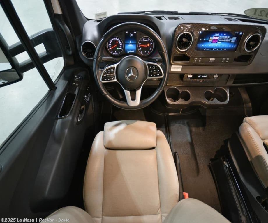 Call now about this 2021 Winnebago Navion 24V! 2021 Winnebago Navion 24V - Used Class C For Sale by La Mesa | RecVan - Davie in Davie, Florida