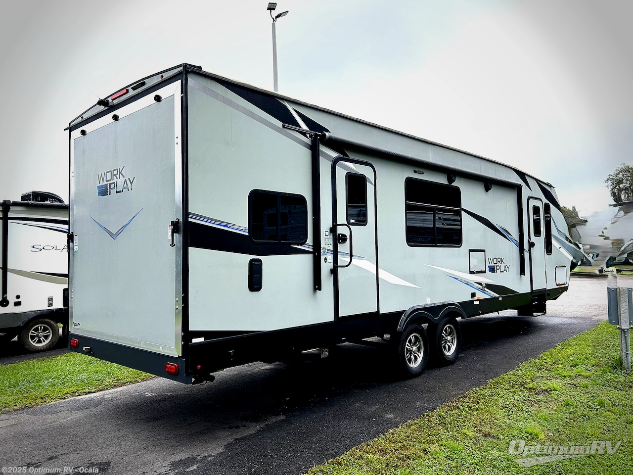 Call now about this 2022 Forest River Work and Play 29SS! 2022 Forest River Work and Play 29SS - Used Travel Trailer For Sale by Optimum RV - Ocala in Ocala, Florida features Awning, Slideout