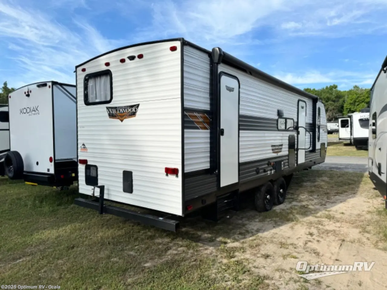 Call now about this 2022 Forest River Wildwood 26DBUD! 2022 Forest River Wildwood 26DBUD - Used Travel Trailer For Sale by Optimum RV - Ocala in Ocala, Florida features Slideout, Awning