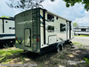 Call now about this 2021 Keystone Passport SL 219BH! 2021 Keystone Passport SL 219BH - Used Travel Trailer For Sale by Optimum RV - Ocala in Ocala, Florida features Awning