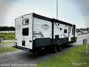 Call now about this 2021 Olympia Olympia 26BHS! 2021 Olympia Olympia 26BHS - Used Travel Trailer For Sale by Optimum RV - Ocala in Ocala, Florida features Slideout, Awning