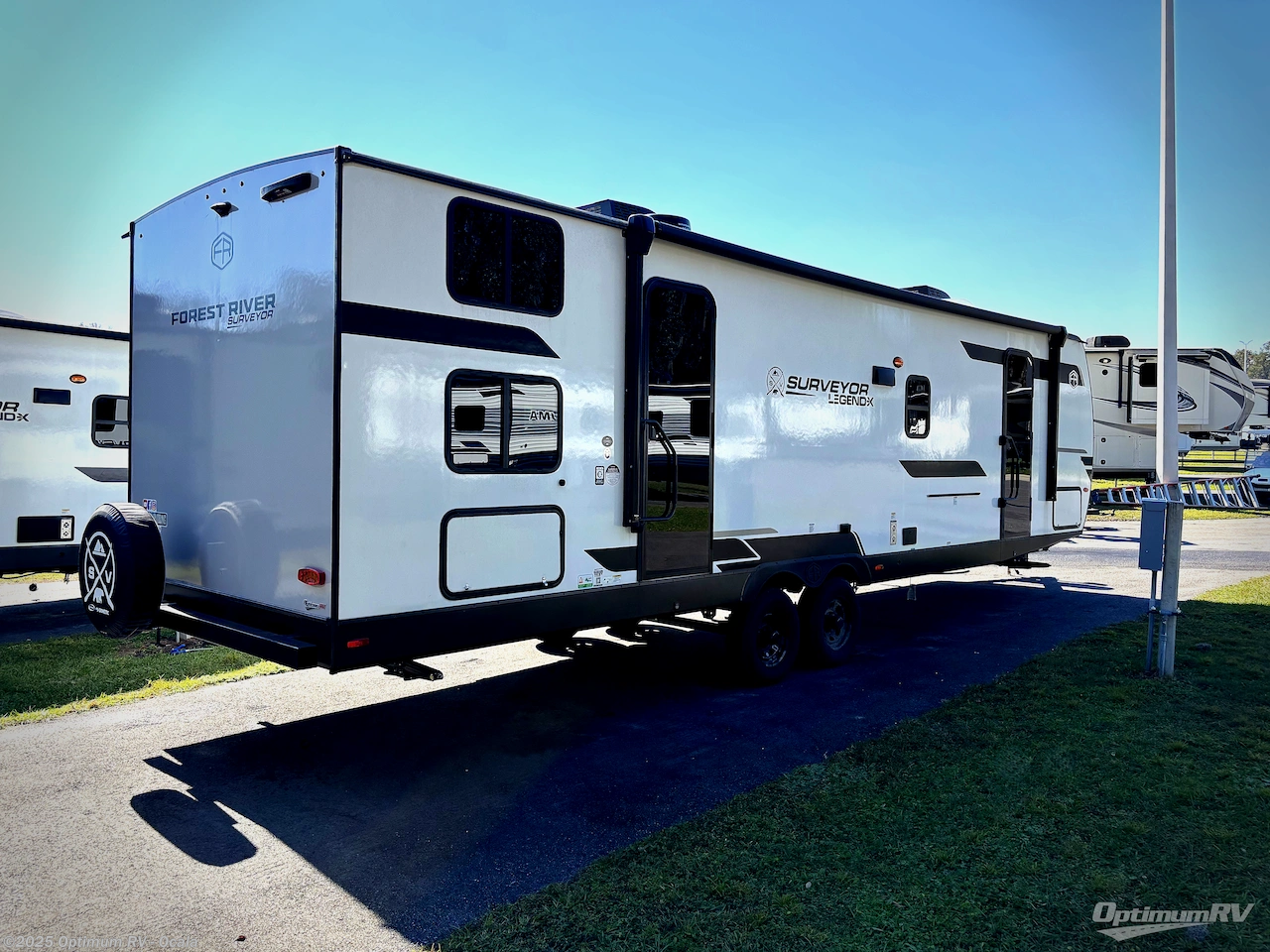 Call now about this 2025 Forest River Surveyor Legend X 29CAMP! 2025 Forest River Surveyor Legend X 29CAMP - New Travel Trailer For Sale by Optimum RV - Ocala in Ocala, Florida features Awning, Slideout