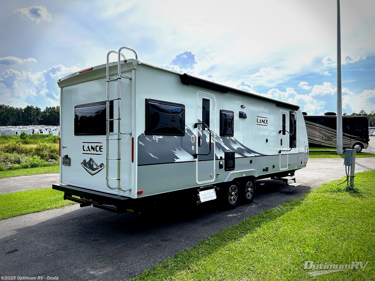 Call now about this 2025 Lance Lance Travel Trailers 2565! 2025 Lance Lance Travel Trailers 2565 - New Travel Trailer For Sale by Optimum RV - Ocala in Ocala, Florida features Slideout