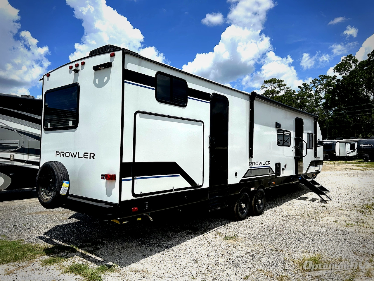 Call now about this 2025 Heartland Prowler 3209BH! 2025 Heartland Prowler 3209BH - Used Travel Trailer For Sale by Optimum RV - Ocala in Ocala, Florida features Slideout, Awning