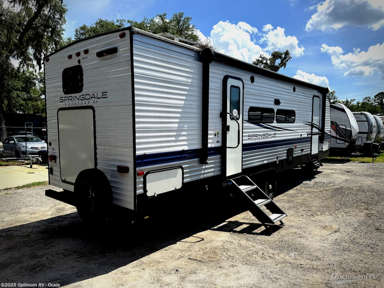 Call now about this 2023 Keystone Springdale 286BHU! 2023 Keystone Springdale 286BHU - Used Travel Trailer For Sale by Optimum RV - Ocala in Ocala, Florida features Slideout, Awning