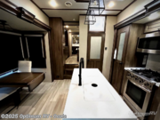 Call now about this 2021 Grand Design Solitude 380FL! 2021 Grand Design Solitude 380FL - Used Fifth Wheel For Sale by Optimum RV - Ocala in Ocala, Florida features Awning, Slideout