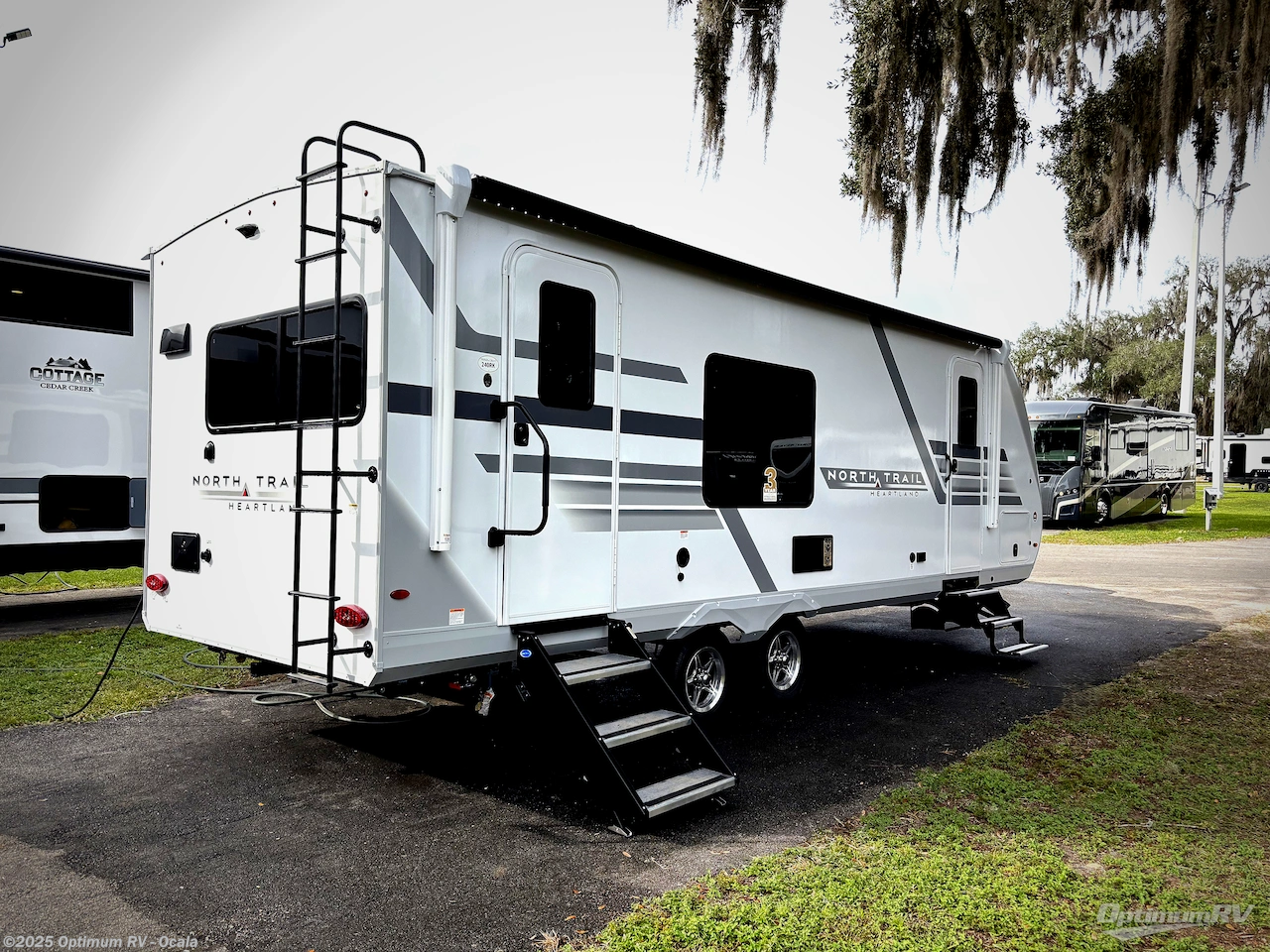 Call now about this 2026 Heartland North Trail 240RK! 2026 Heartland North Trail 240RK - New Travel Trailer For Sale by Optimum RV - Ocala in Ocala, Florida features Awning, Slideout