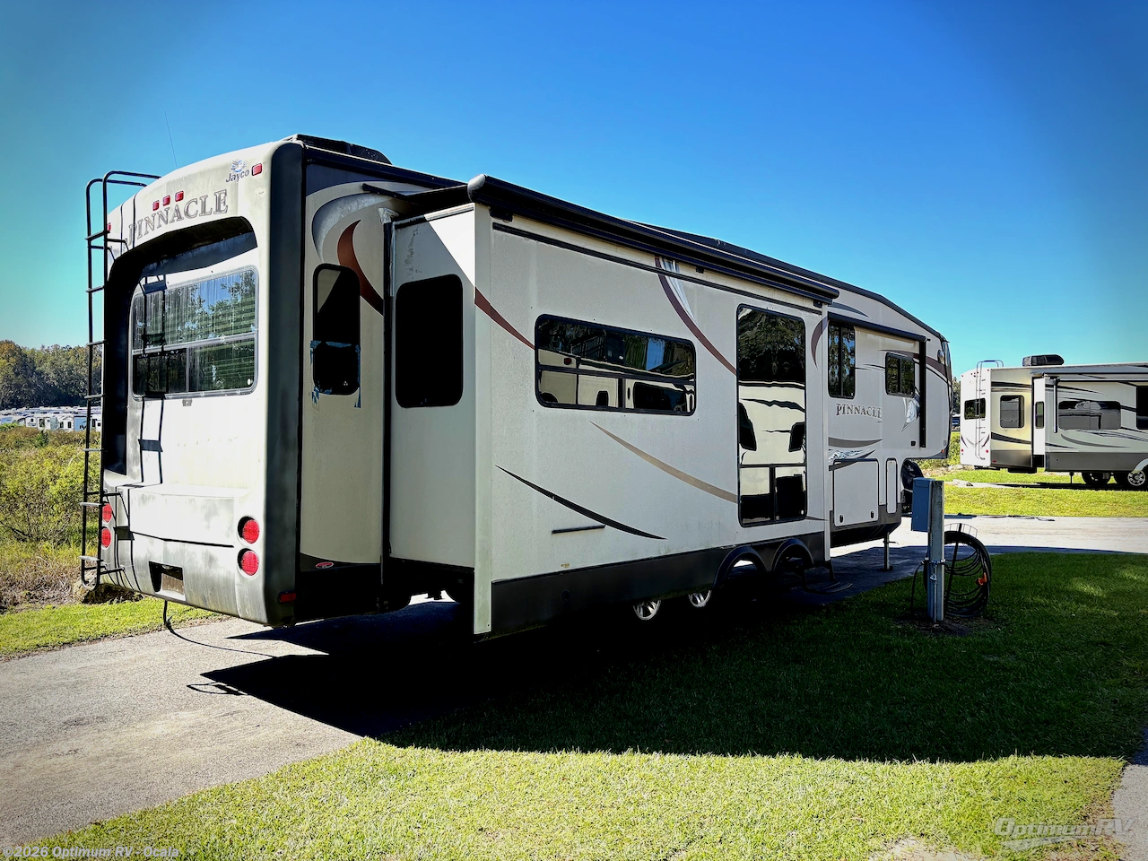 Call now about this 2013 Jayco Pinnacle 36REQS! 2013 Jayco Pinnacle 36REQS - Used Fifth Wheel For Sale by Optimum RV - Ocala in Ocala, Florida features Slideout