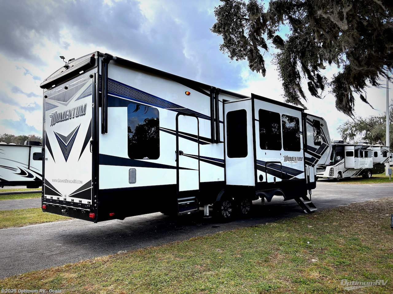 Call now about this 2019 Grand Design Momentum M-Class 351M! 2019 Grand Design Momentum M-Class 351M - Used Fifth Wheel For Sale by Optimum RV - Ocala in Ocala, Florida features Awning, Slideout