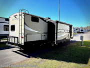 Call now about this 2018 Keystone Cougar X-Lite 34TSB! 2018 Keystone Cougar X-Lite 34TSB - Used Travel Trailer For Sale by Optimum RV - Ocala in Ocala, Florida features Slideout, Awning