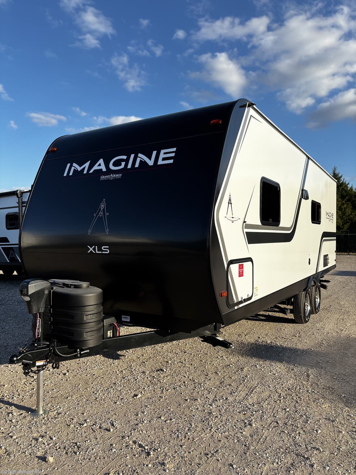 Call now about this 2025 Grand Design Imagine XLS 22RBE! 2025 Grand Design Imagine XLS 22RBE - Used Travel Trailer For Sale by Rendel RV in Rice, Texas features Microwave, Toilet, Stove, Enclosed Underbelly, Backup Camera
