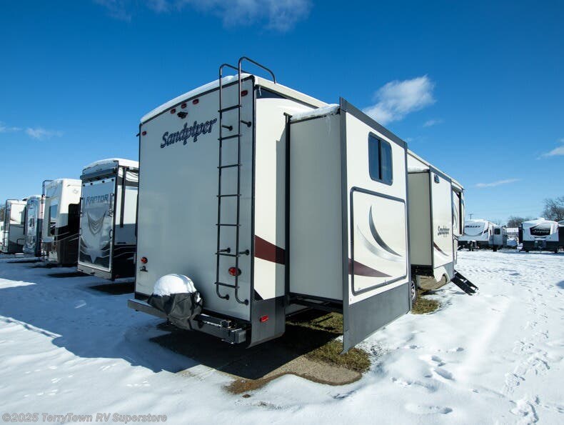 Contact us now about this 2019 Forest River Sandpiper 384QBOK! 2019 Sandpiper 384QBOK by Forest River from TerryTown RV Superstore in Grand Rapids, Michigan