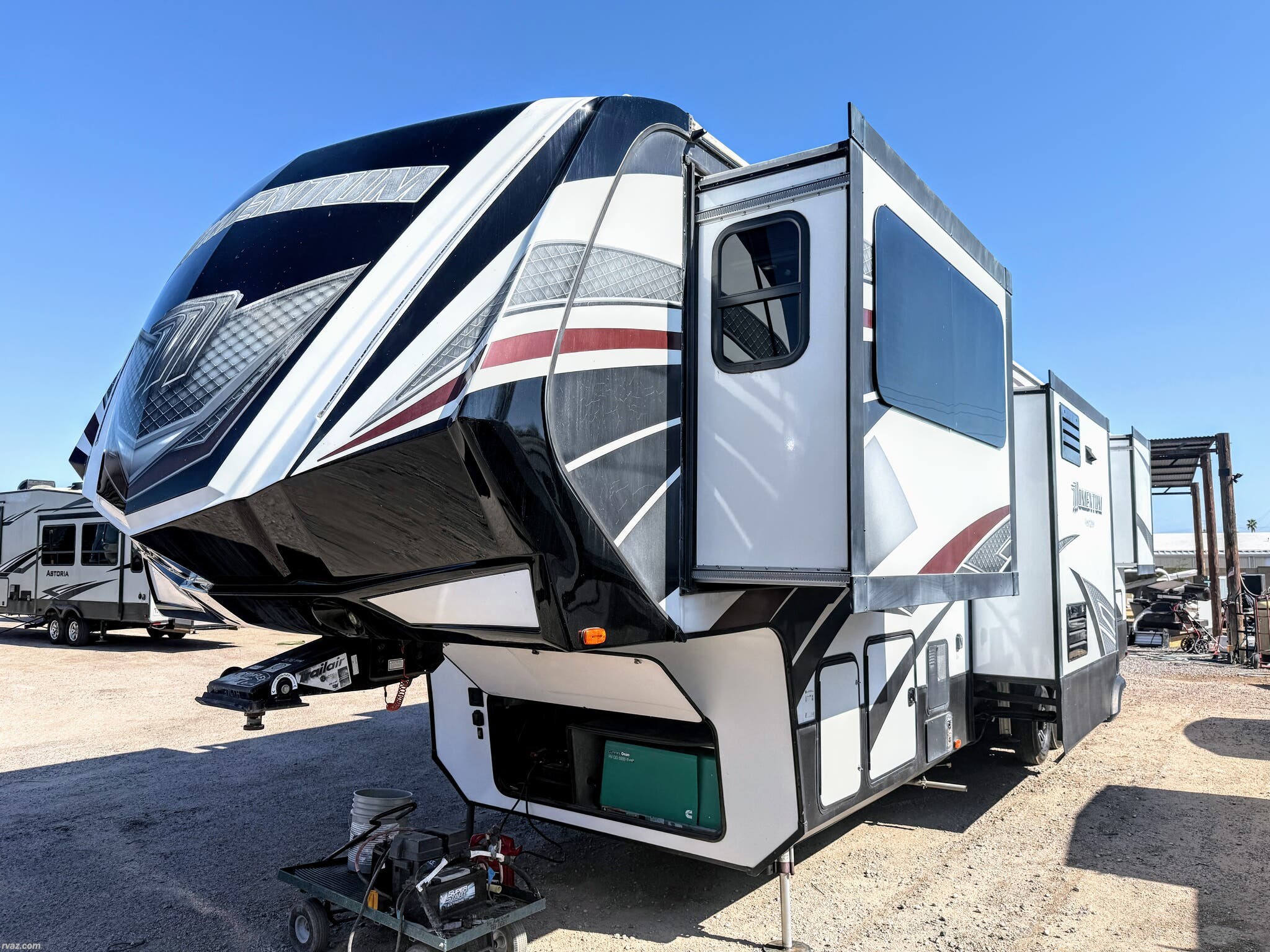 Call now about this 2016 Grand Design Momentum 376TH! 2016 Grand Design Momentum 376TH - Used Toy Hauler For Sale by RV AZ Corral in Mesa, Arizona features Sound Bar, Tinted Windows, Enclosed Water Tank, Free Standing Dinette w/Chairs, Auxiliary Battery