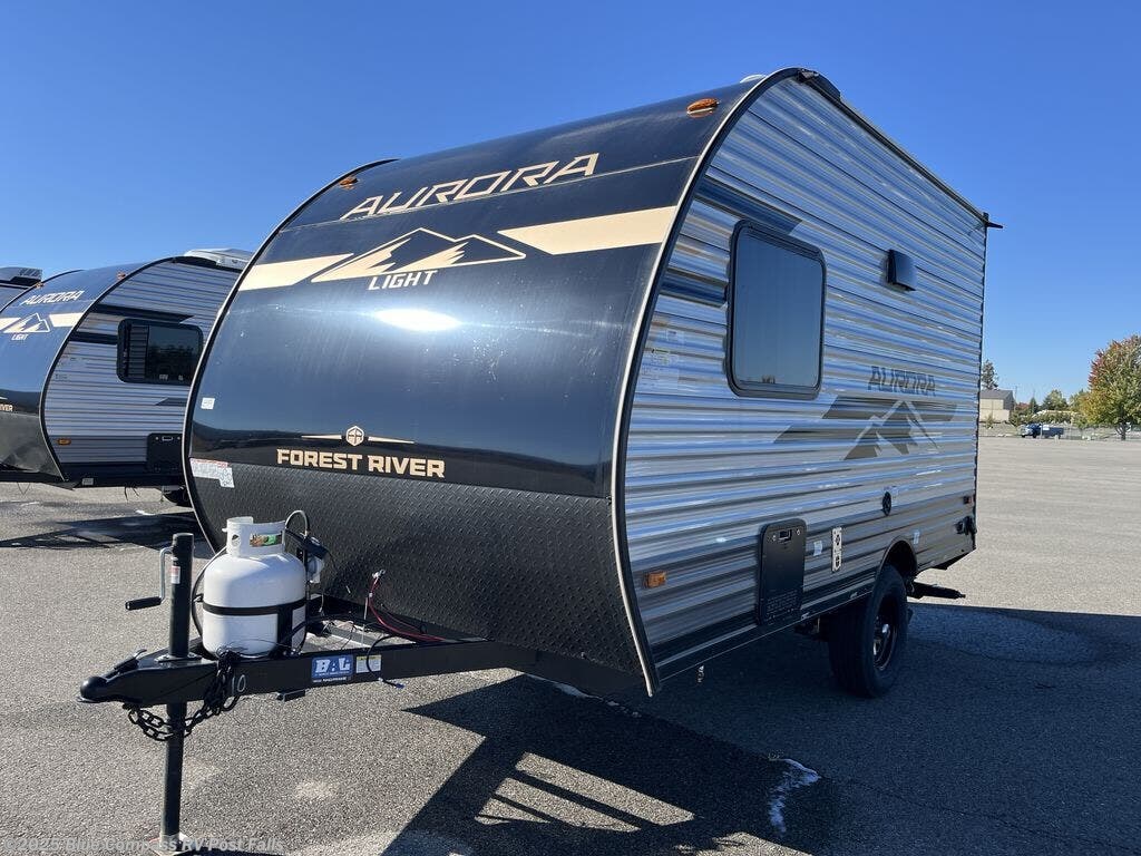 Contact us now about this 2025 Forest River Aurora Light 13BHX! 2025 Aurora Light 13BHX by Forest River from Blue Compass RV Post Falls in Post Falls, Idaho
