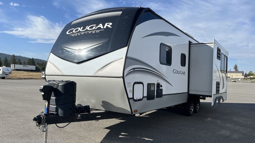 Contact us now about this 2022 Keystone Cougar Half-Ton 25RDSWE! 2022 Cougar Half-Ton 25RDSWE by Keystone from Blue Compass RV Post Falls in Post Falls, Idaho