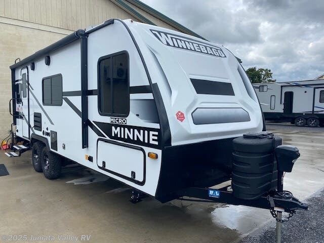 Call now about this 2025 Winnebago Micro Minnie 2225RL! 2025 Winnebago Micro Minnie 2225RL - New Travel Trailer For Sale by Juniata Valley RV in Mifflintown, Pennsylvania features Dinette Bed, Slam Latch Baggage Doors, LED Lights, TV, Heated Water Tank
