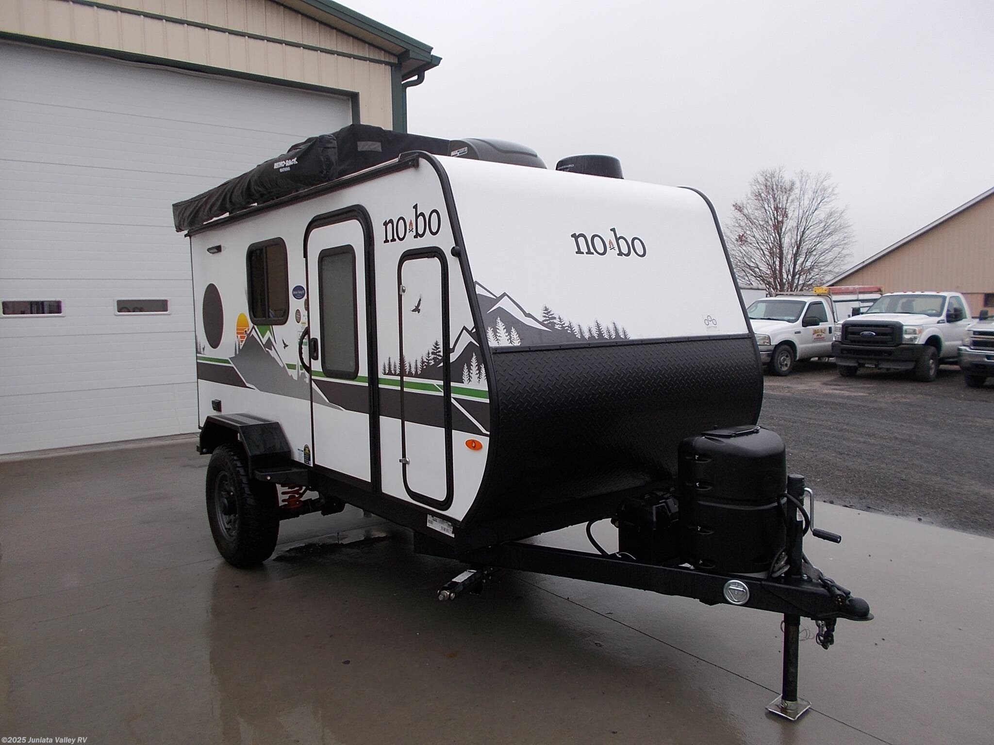 Call now about this 2024 Forest River No Boundaries NB10.7! 2024 Forest River No Boundaries NB10.7 - Used Travel Trailer For Sale by Juniata Valley RV in Mifflintown, Pennsylvania features Fiberglass Sidewalls, Tinted Windows, LP Detector, Smoke Detector, Battery Charger