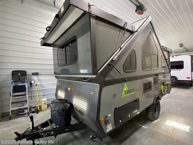 Call now about this 2025 Aliner Evolution 15! 2025 Aliner Evolution 15 - New Popup For Sale by Juniata Valley RV in Mifflintown, Pennsylvania features Solid Surface Countertops, Fantastic Fan, Pantry, External Shower, Tinted Windows