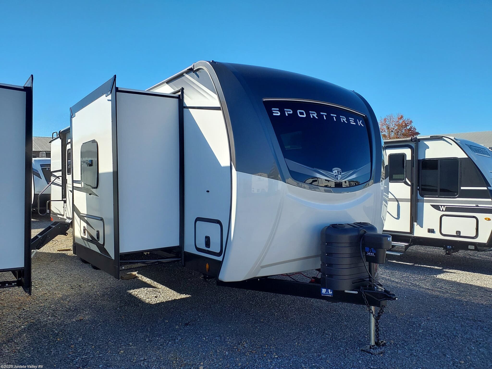 Call now about this 2026 Venture RV SportTrek Touring Edition STT292VRB! 2026 Venture RV SportTrek Touring Edition STT292VRB - New Travel Trailer For Sale by Juniata Valley RV in Mifflintown, Pennsylvania features Glass Shower Door, Awning, Slideout, Sound Bar, Spare Tire Kit
