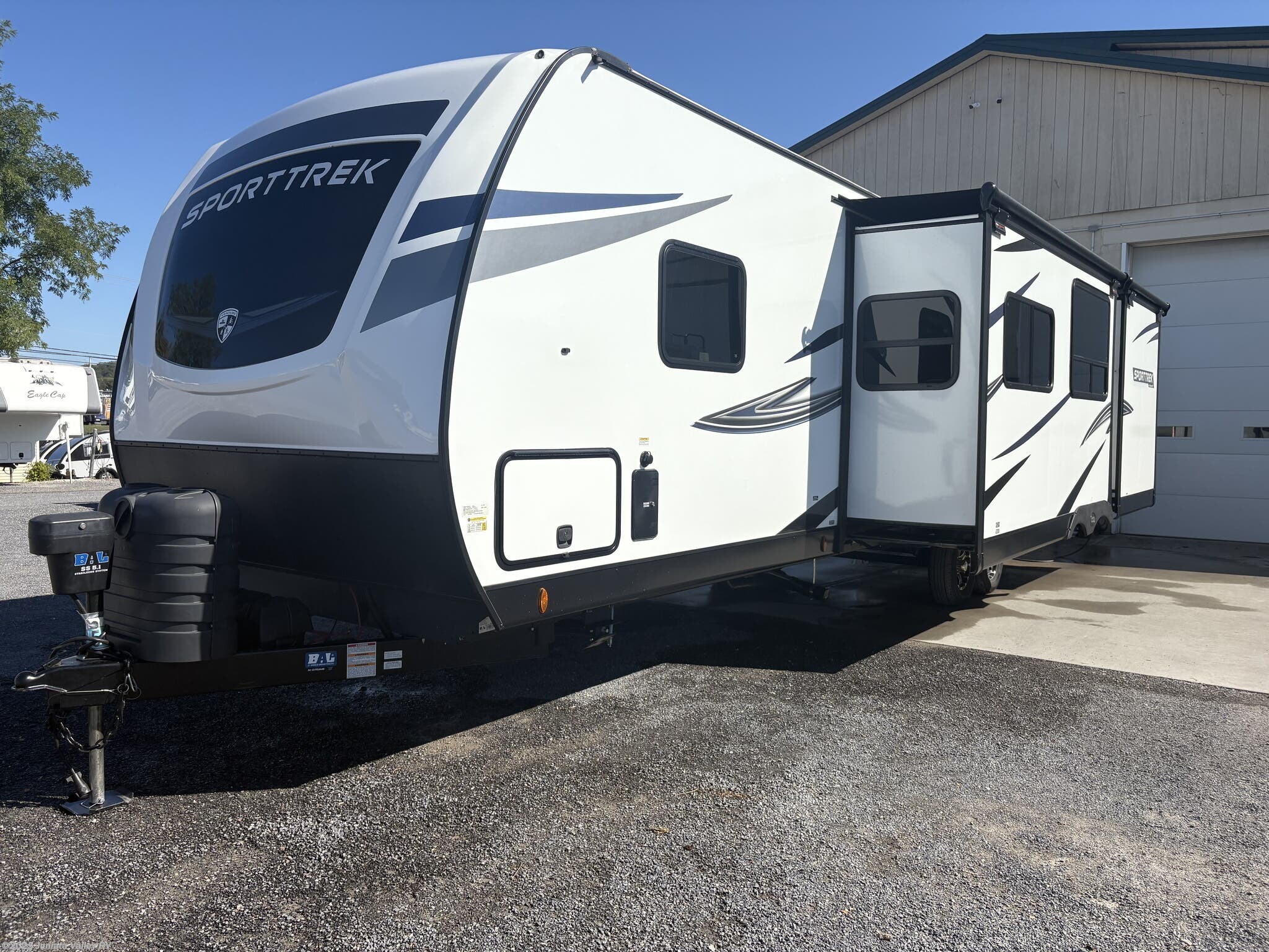 Call now about this 2024 Venture RV SportTrek 333VIK! 2024 Venture RV SportTrek 333VIK - Used Travel Trailer For Sale by Juniata Valley RV in Mifflintown, Pennsylvania features Glass Shower Door, Theater Seating, Pass Thru Storage, Queen Bed, Stove