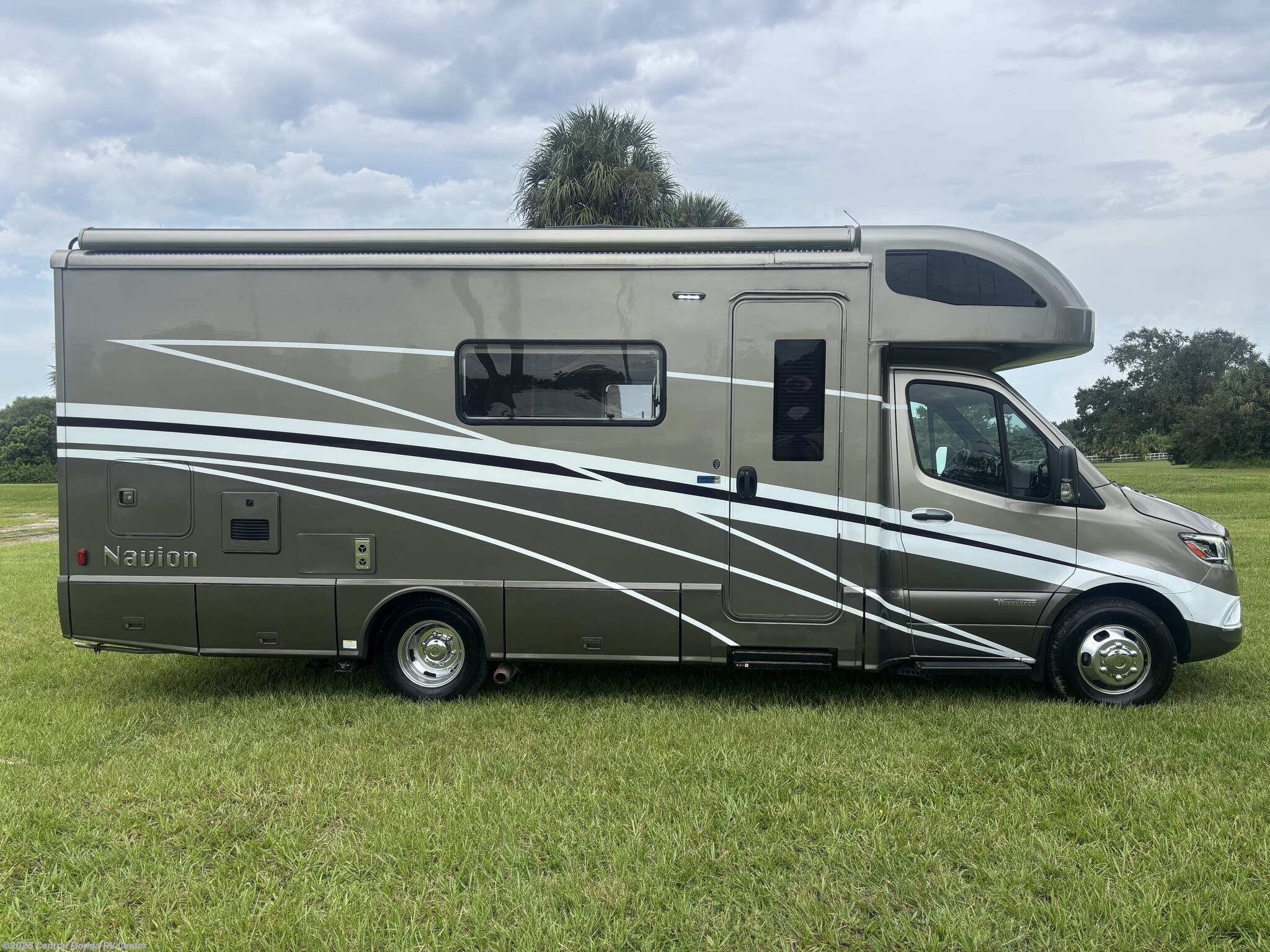Contact us now about this 2023 Winnebago Navion 24D! 2023 Navion 24D by Winnebago from Central Florida RV Center in Apopka, Florida
