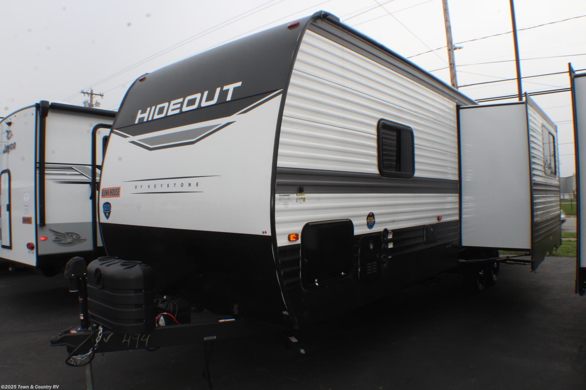 Email now about this 2025 Keystone Hideout 28BUS! New 2025 Keystone Hideout 28BUS available in Clyde, Ohio