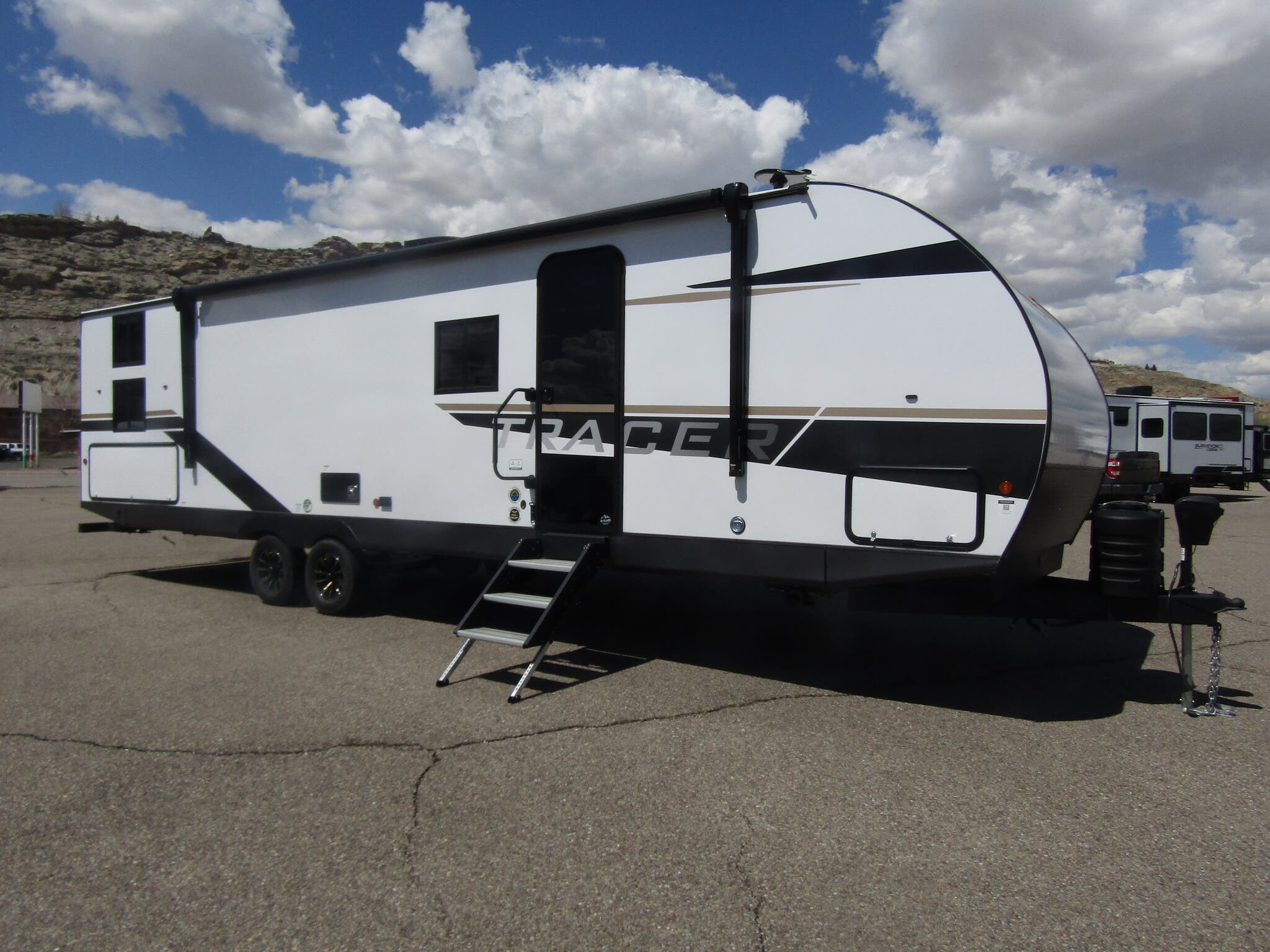 Call now about this 2025 Prime Time Tracer 308BH! 2025 Prime Time Tracer 308BH - New Travel Trailer For Sale by First Choice RVs in Rock Springs, Wyoming features Refrigerator, CO Detector, Enclosed Water Tank, Bunk Beds, Fire Extinguisher