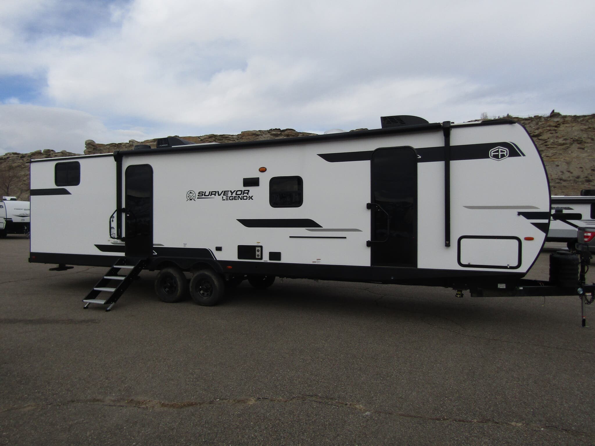Email now about this 2025 Forest River Surveyor Legend X 32CAMP! New 2025 Forest River Surveyor Legend X 32CAMP available in Rock Springs, Wyoming