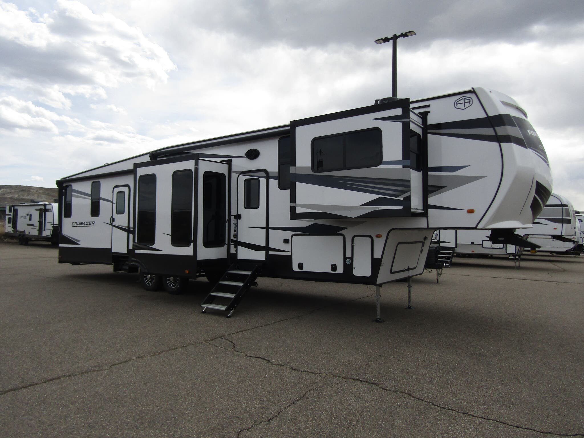 Call now about this 2025 Prime Time Crusader Full-Profile 375FLS! 2025 Prime Time Crusader Full-Profile 375FLS - New Fifth Wheel For Sale by First Choice RVs in Rock Springs, Wyoming features Skylight, External Shower, Microwave, Oven, Roof Vents