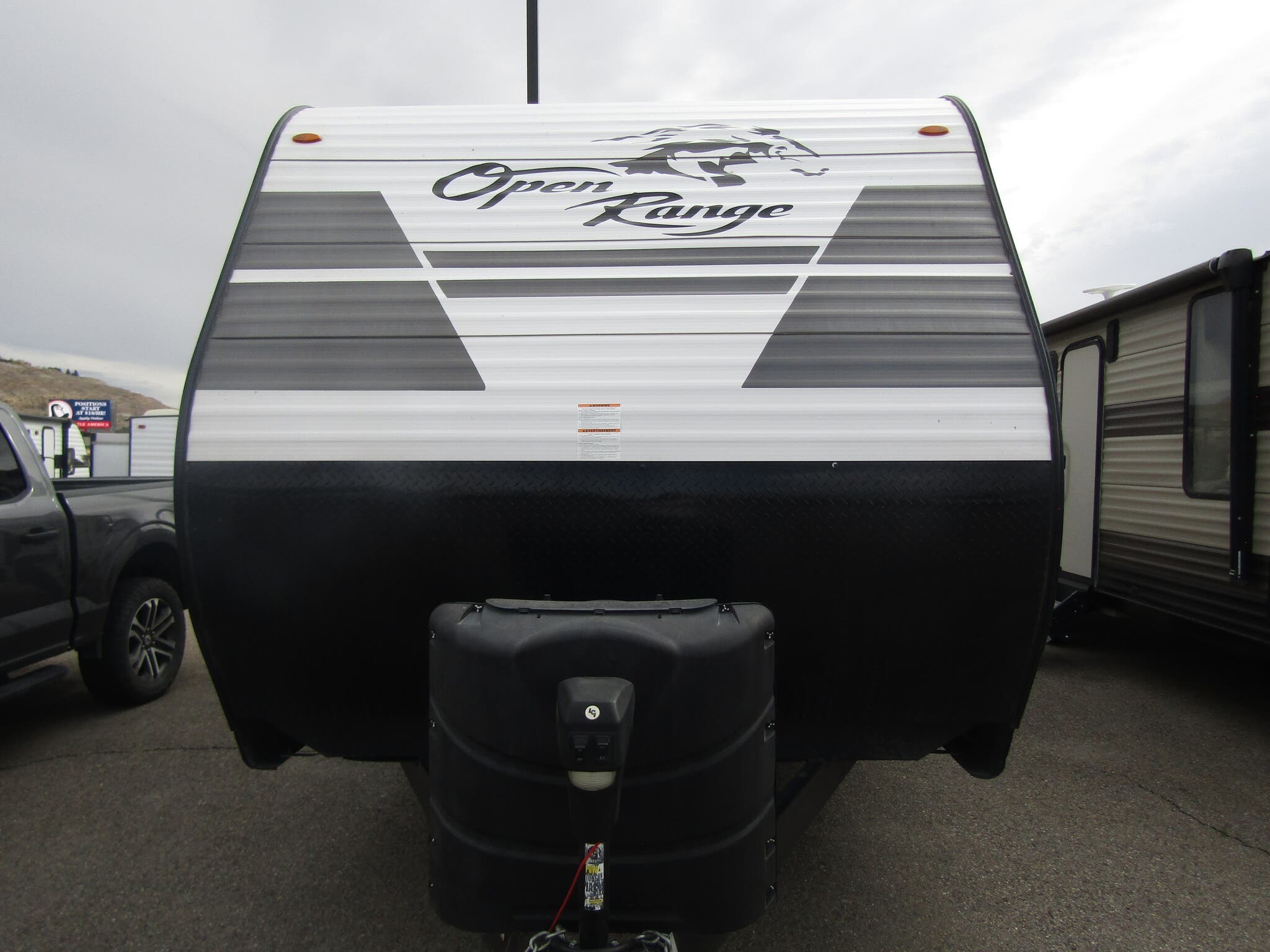 Call now about this 2022 Highland Ridge Open Range Conventional 20FBSW! 2022 Highland Ridge Open Range Conventional 20FBSW - Used Travel Trailer For Sale by First Choice RVs in Rock Springs, Wyoming features Medicine Cabinet, Auxiliary Battery, Exterior Speakers, CO Detector, Awning