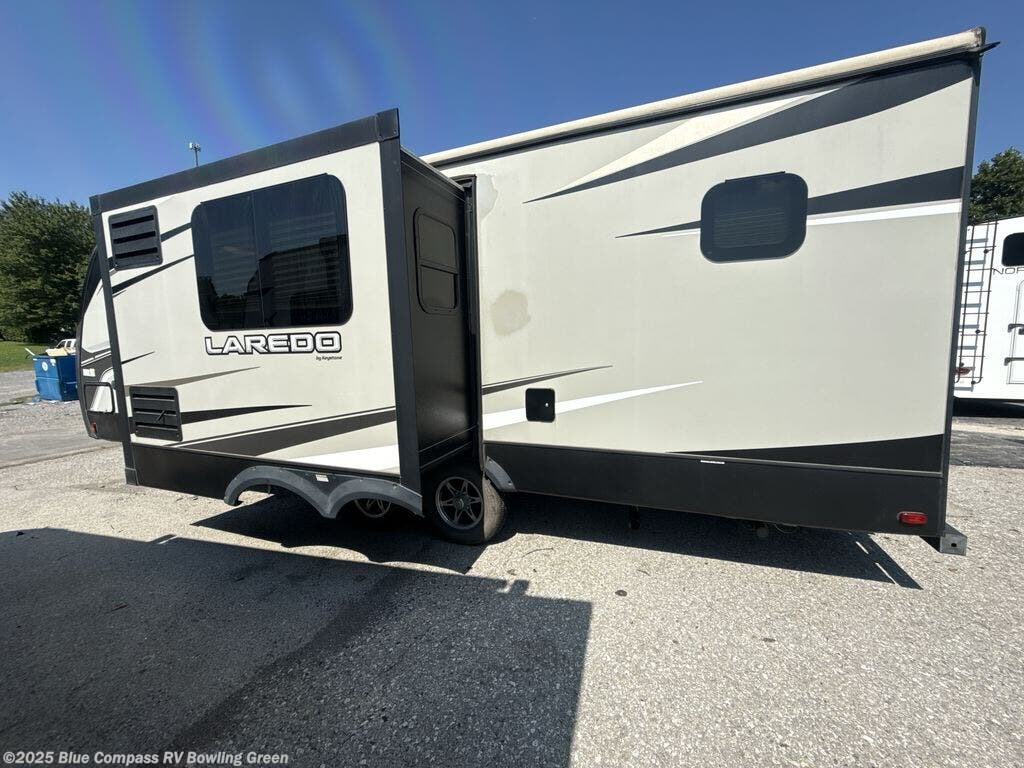 Contact us now about this 2019 Keystone Laredo 250BH! 2019 Laredo 250BH by Keystone from Blue Compass RV Bowling Green in Bowling Green, Kentucky