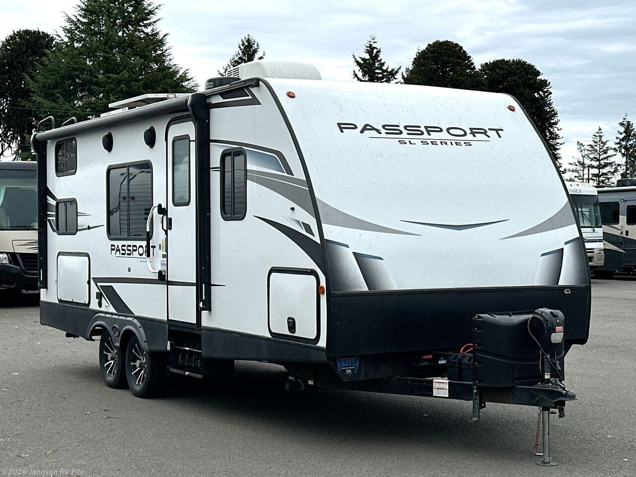 Contact us now about this 2023 Keystone Passport SL Series West 219BHWE! 2023 Passport SL Series West 219BHWE by Keystone from Johnson RV Fife in Fife, Washington