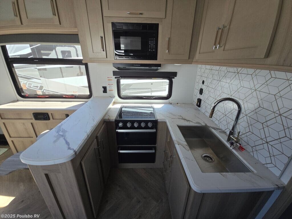 Call now about this 2025 Keystone Raptor Carbon 360! 2025 Keystone Raptor Carbon 360 - New Fifth Wheel For Sale by Poulsbo RV in Mount Vernon, Washington features Awning