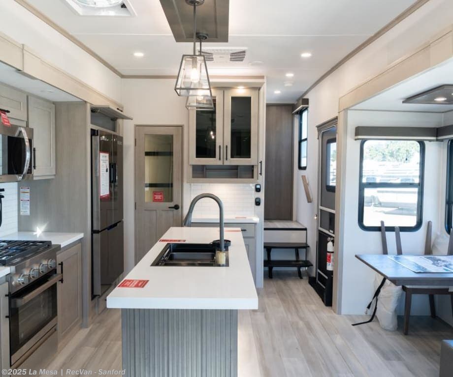 Call now about this 2026 Grand Design Solitude INFLUEN 3003RL! 2026 Grand Design Solitude INFLUEN 3003RL - New Fifth Wheel For Sale by La Mesa | RecVan - Sanford in Sanford, Florida