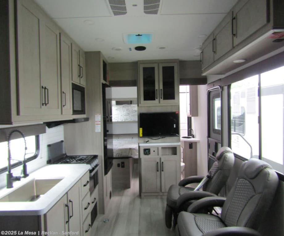 Call now about this 2026 Grand Design Momentum 21G! 2026 Grand Design Momentum 21G - New Toy Hauler For Sale by La Mesa | RecVan - Sanford in Sanford, Florida