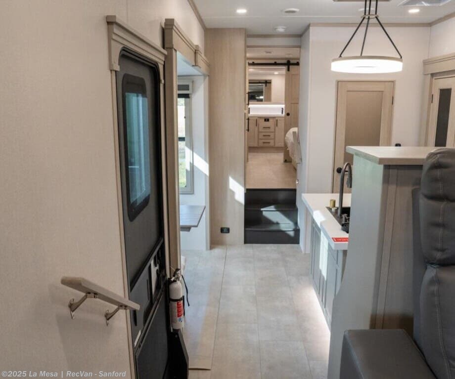 Contact us now about this 2026 Grand Design Solitude 380FL! 2026 Solitude 380FL by Grand Design from La Mesa | RecVan - Sanford in Sanford, Florida