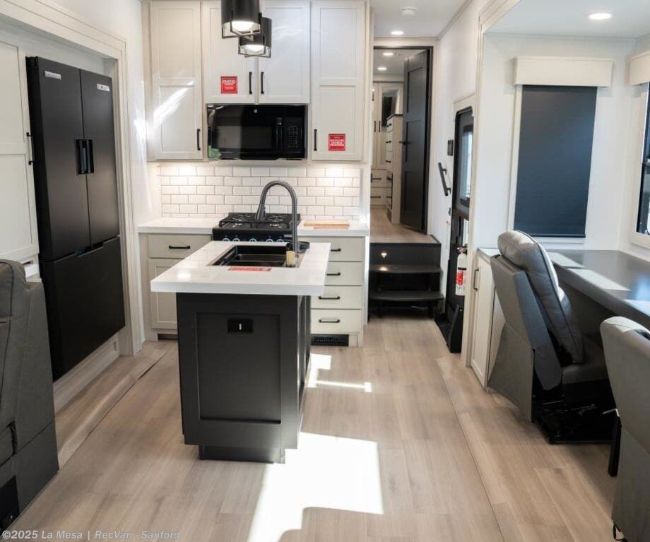 Call now about this 2026 Grand Design Momentum 399M! 2026 Grand Design Momentum 399M - New Toy Hauler For Sale by La Mesa | RecVan - Sanford in Sanford, Florida