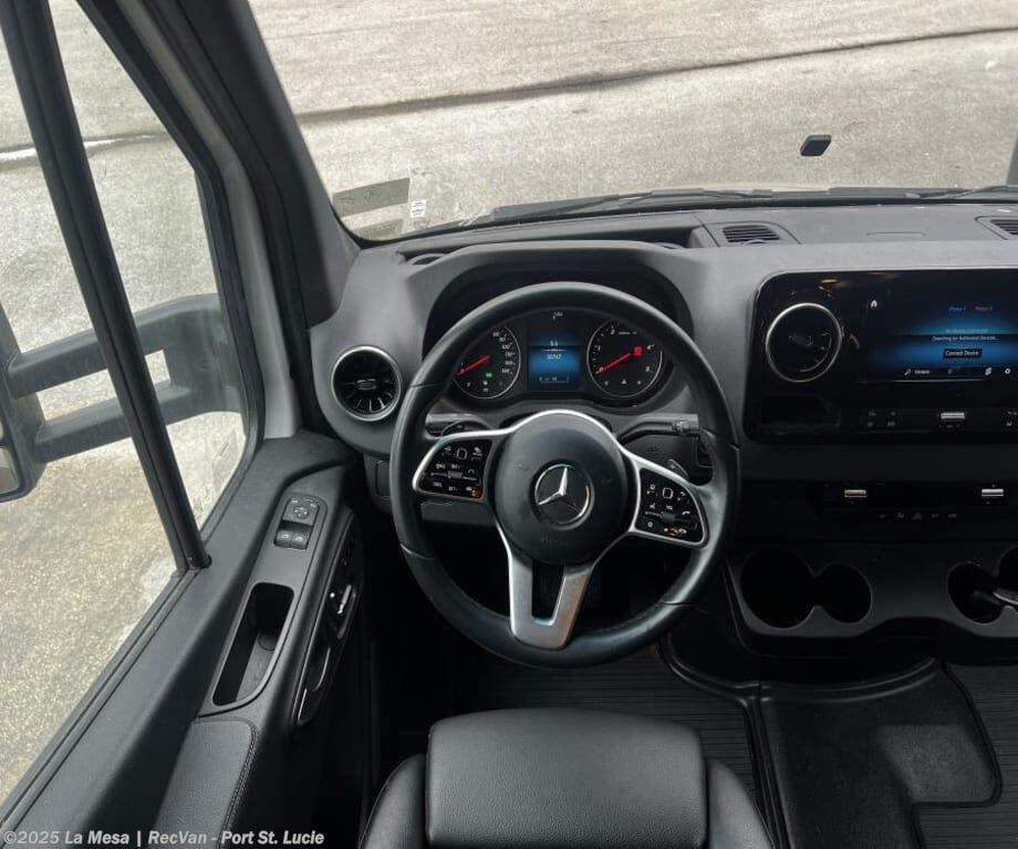 Call now about this 2023 Tiffin Wayfarer 25RW! 2023 Tiffin Wayfarer 25RW - Used Class C For Sale by La Mesa | RecVan - Port St. Lucie in Port St. Lucie, Florida