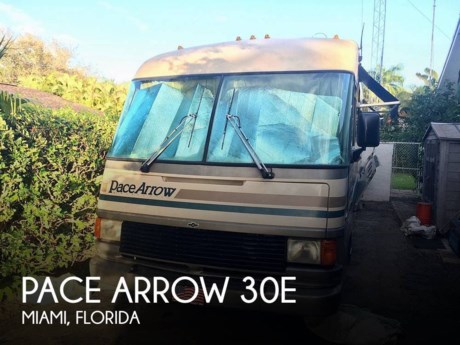 &lt;u&gt;Stock #119077 - &lt;/u&gt;&lt;br&gt;&lt;br&gt;&lt;strong&gt;Amazing Condition, Almost New, 9700 Original Miles!!!&lt;/strong&gt;&lt;br&gt;&lt;br&gt;ONE-OWNER Custom Built 1994 Pace Arrow 30E powered by  a Chevrolet 454 with ONLY 9700 original miles. This RV was factory ordered by its owner back in 1994 and never had the chance to go on as many adventures as they planned for it. Unit is loaded and Interior is as close to NEW as it gets on a 22-yr old motor vehicle.&lt;br&gt;&lt;br&gt;This unit has been WELL MAINTAINED and NEVER LIVED IN.&lt;br&gt;&lt;br&gt;Come in through the side door and you&#39;ll find yourself in the middle of the living area. There&#39;s a convertible sofa, a recliner seat, and plenty of overhead cabinet space. To your right you&#39;ll find the driving station, with an overhead entertaining center. Turn left and you&#39;ll find the kitchen area with a fully equipped galley and a convertible dinette. The kitchen is equipped with solid wood cabinetry, hardwood flooring, Corian countertops, 3-burner stove, oven, coffee maker, microwave, double sink and refrigerator/freezer. Continue walking towards the back of the RV and you&#39;ll find a solid wood (cedar lined) closet to your right and a full size bathroom to your left. The bathroom comes equipped with a toilet, sink, cabinet and tub shower. Continue walking towards the back and you&#39;ll find a bedroom with two twin-size beds, a nightstand, overhead cabinetry and a TV. &lt;br&gt;&lt;br&gt;This RV comes loaded with factory standard and custom-ordered features/options!!!&lt;br&gt;&lt;br&gt;Additional Features:&lt;br&gt;- Automatic Transmission&lt;br&gt;- Onan 4kW Generator with ONLY 509 hrs&lt;br&gt;- Coleman Roof-Top AC - 13.5K BTU&lt;br&gt;- 4x Awnings&lt;br&gt;- Driver Side Door&lt;br&gt;- 3x Batteries (1x motor, 2x house)&lt;br&gt;- 6-gal water heater&lt;br&gt;- Basement Floor Construction&lt;br&gt;- Luggage Compartments (full RV width)&lt;br&gt;- TV antenna&lt;br&gt;- LPG Tank&lt;br&gt;- Towing Package&lt;br&gt;- Stainless Set&lt;br&gt;- Stereo System&lt;br&gt;&lt;br&gt;We are looking for people all over the country who share our love for boats/RVs.  If you have a passion for our product and like the idea of working from home, please visit Careeers [dot] PopSells [dot] com to learn more.&lt;br&gt;&lt;br&gt;&lt;em&gt;Please submit any and ALL offers - your offer may be accepted!  Submit your offer today!&lt;/em&gt;&lt;br&gt;&lt;br&gt;&lt;em&gt;Reason for selling is not using..&lt;/em&gt;&lt;br&gt;&lt;br&gt;You have questions?  We have answers.  Call us at (941) 200-1030 to discuss this RV.&lt;br&gt;&lt;br&gt;Selling your RV has never been easier. At Pop RVs, we literally sell thousands of units every year all over the country. Call (855) 273-7188 and we&#39;ll get started selling your RV today.