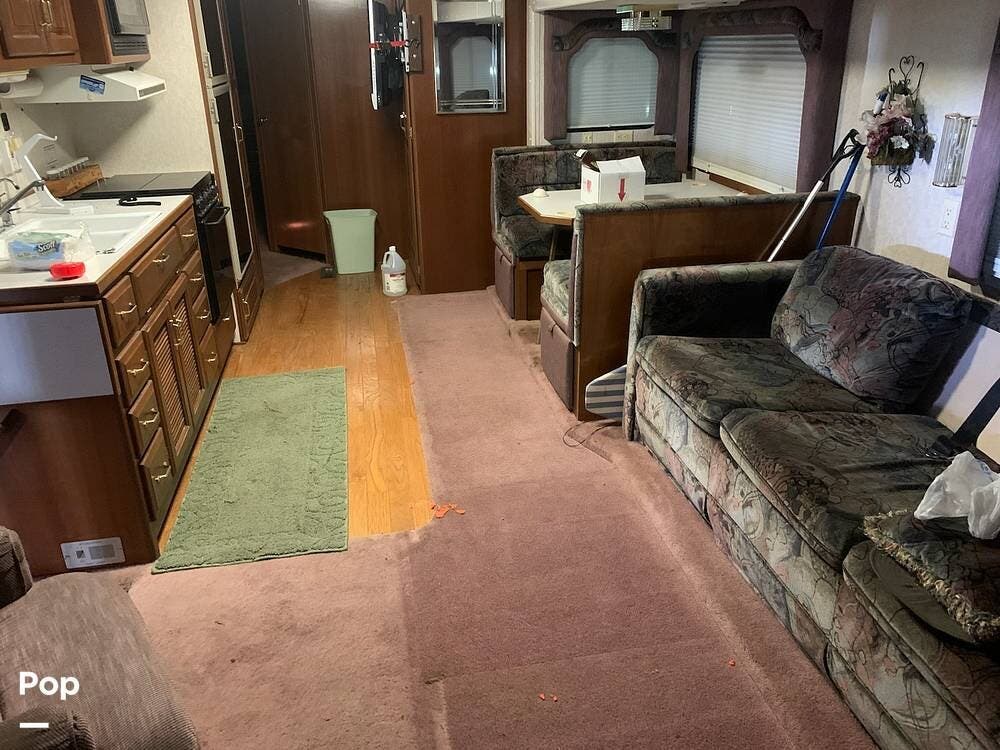 Call now about this 1994 Newmar Kountry Star 40CBSA! 1994 Newmar Kountry Star 40CBSA - Used Diesel Pusher For Sale by Pop RVs in Gilman, Illinois features Slideout, Generator, Air Conditioning, Leveling Jacks, Awning
