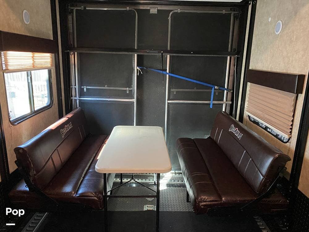 Call now about this 2015 Prime Time Spartan 3210! 2015 Prime Time Spartan 3210 - Used Toy Hauler For Sale by Pop RVs in San Antonio, Texas features Air Conditioning, Slideout, Leveling Jacks, Generator, Awning