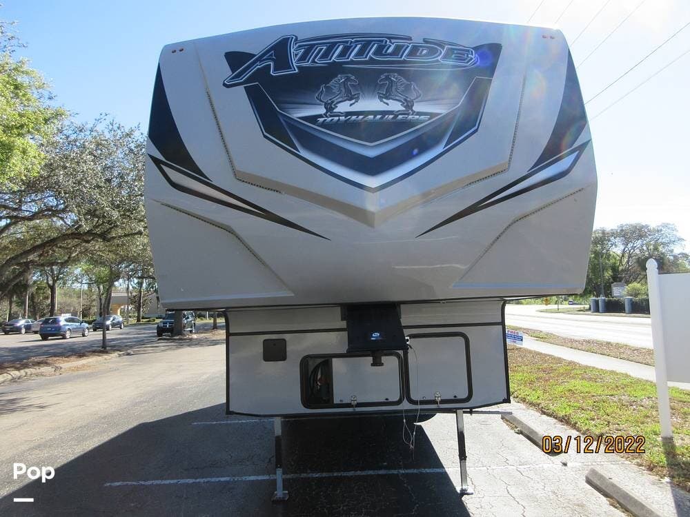 Call now about this 2022 Eclipse Attitude Pro 2816SAG! 2022 Eclipse Attitude Pro 2816SAG - Used Toy Hauler For Sale by Pop RVs in Gulf Breeze, Florida features Leveling Jacks, Air Conditioning, Generator, Awning, Slideout