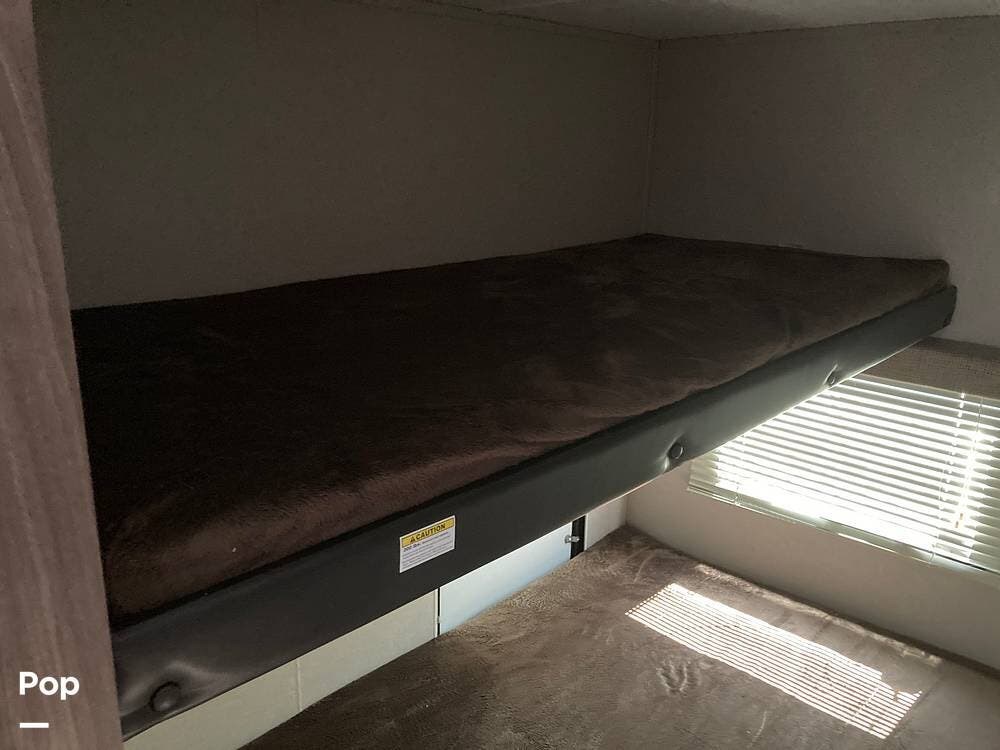 Call now about this 2019 Keystone Hideout 21THWE! 2019 Keystone Hideout 21THWE - Used Toy Hauler For Sale by Pop RVs in Lake Fork, Idaho features Leveling Jacks, Air Conditioning, Awning