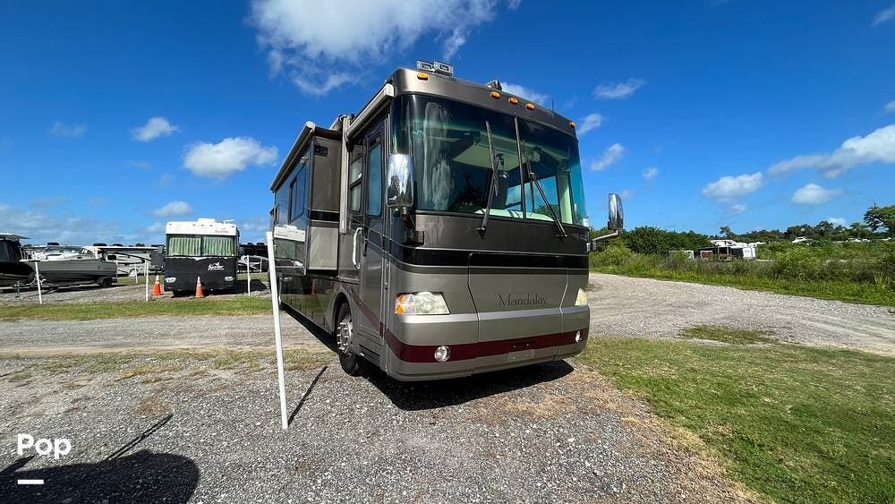 Call now about this 2005 Thor Motor Coach Mandalay 40B! 2005 Thor Motor Coach Mandalay 40B - Used Diesel Pusher For Sale by Pop RVs in Apollo Beach, Florida features Slideout, Generator, Awning, Leveling Jacks, Air Conditioning