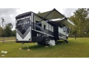 Call now about this 2021 Dutchmen Voltage 4225! 2021 Dutchmen Voltage 4225 - Used Toy Hauler For Sale by Pop RVs in Chipley, Florida features Generator, Leveling Jacks, Air Conditioning, Slideout, Awning