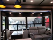 Call now about this 2021 Grand Design Momentum 397TH! 2021 Grand Design Momentum 397TH - Used Toy Hauler For Sale by Pop RVs in Cleveland, Tennessee features Air Conditioning, Leveling Jacks, Awning, Slideout